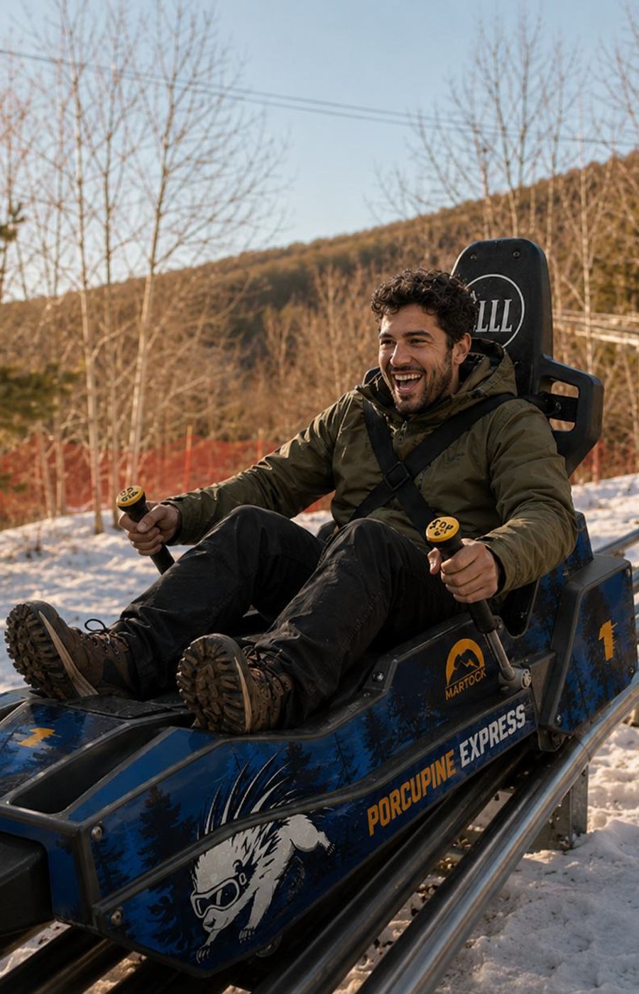 Rider smiling on the mountain coaster
