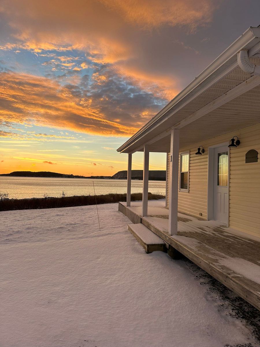 Lantern Hill & Hollow cottage porch at sunset