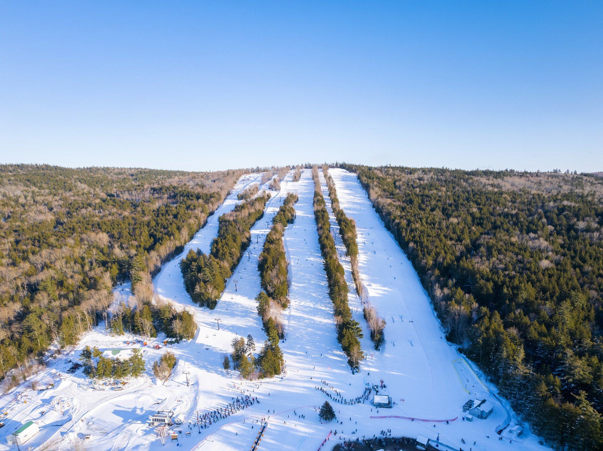 Aerial view of the Ski Martock trails on a bright winter afternoon