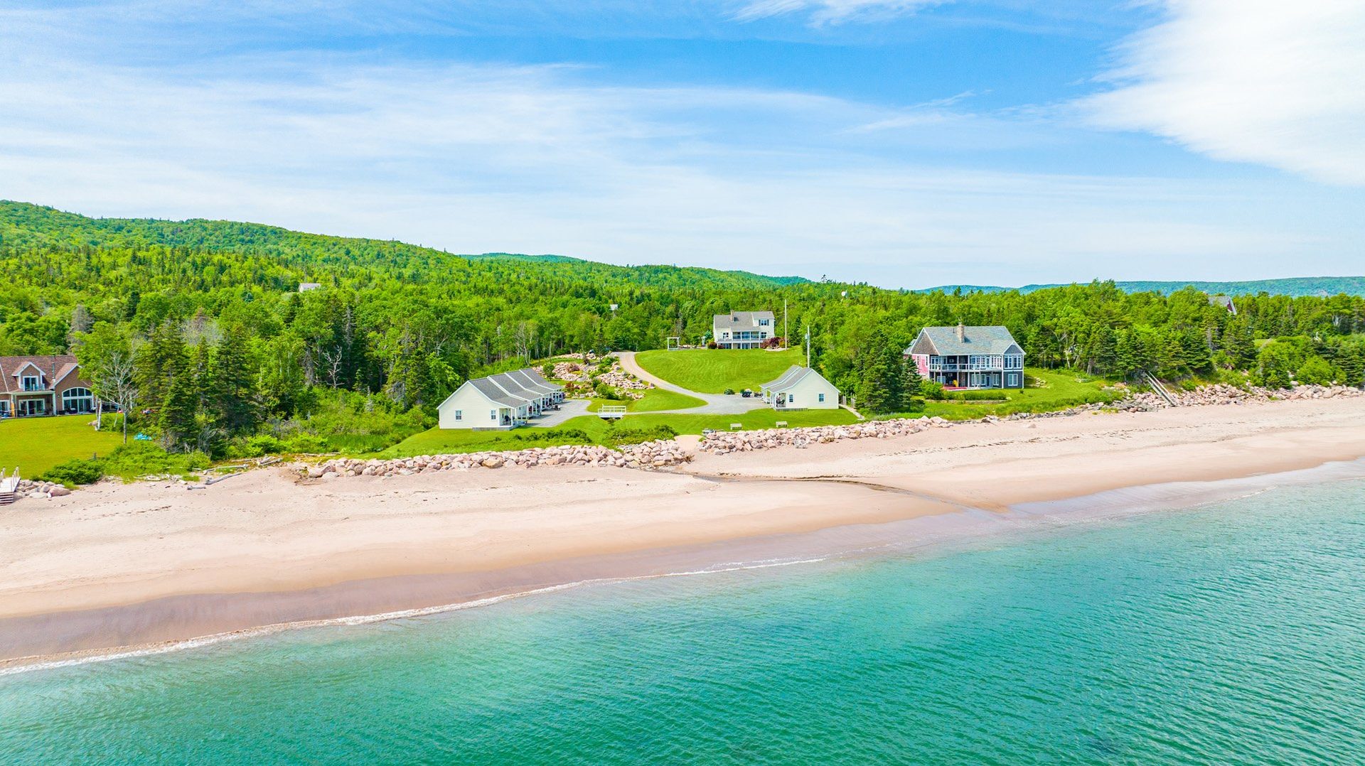 Aerial view of the Lantern Hill & Hollow property on the Cape Breton shoreline near Cape Smokey